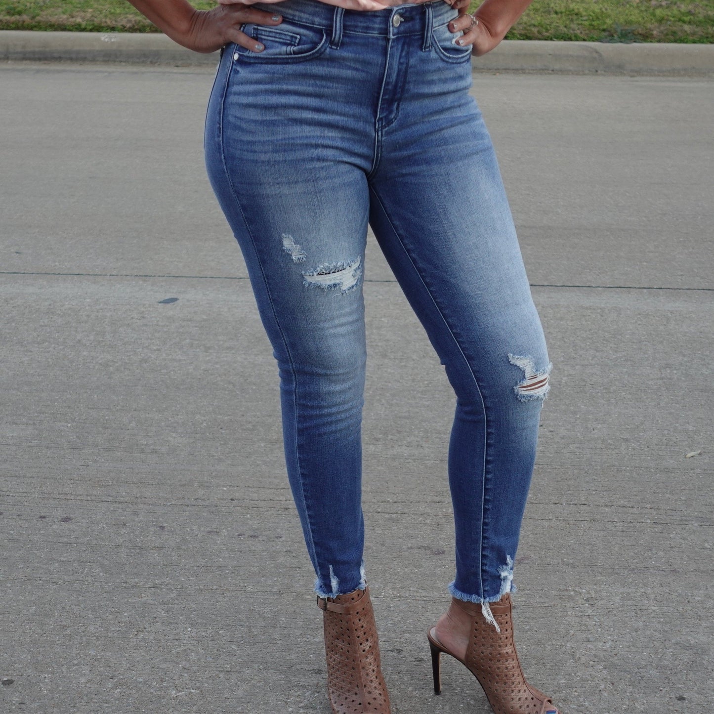 High Rise Distressed Hem Skinny Jean